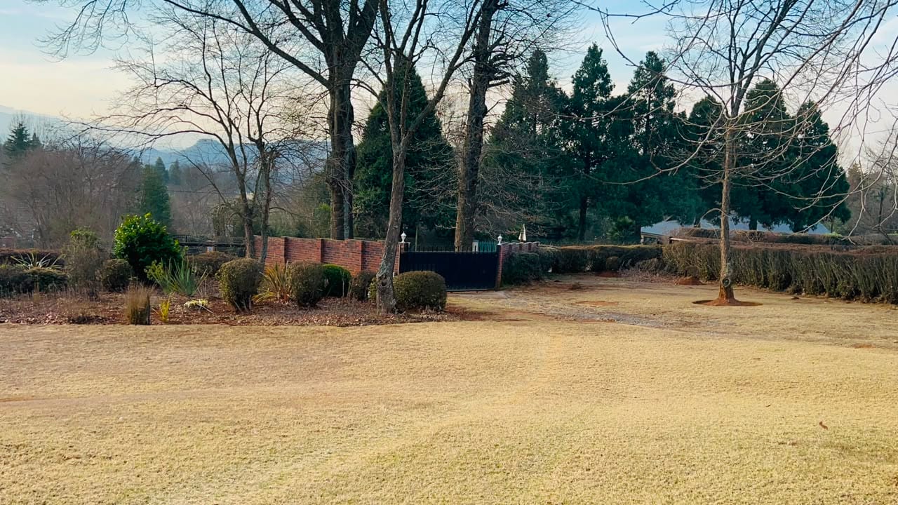 The lawn and garden looking west toward the mountains